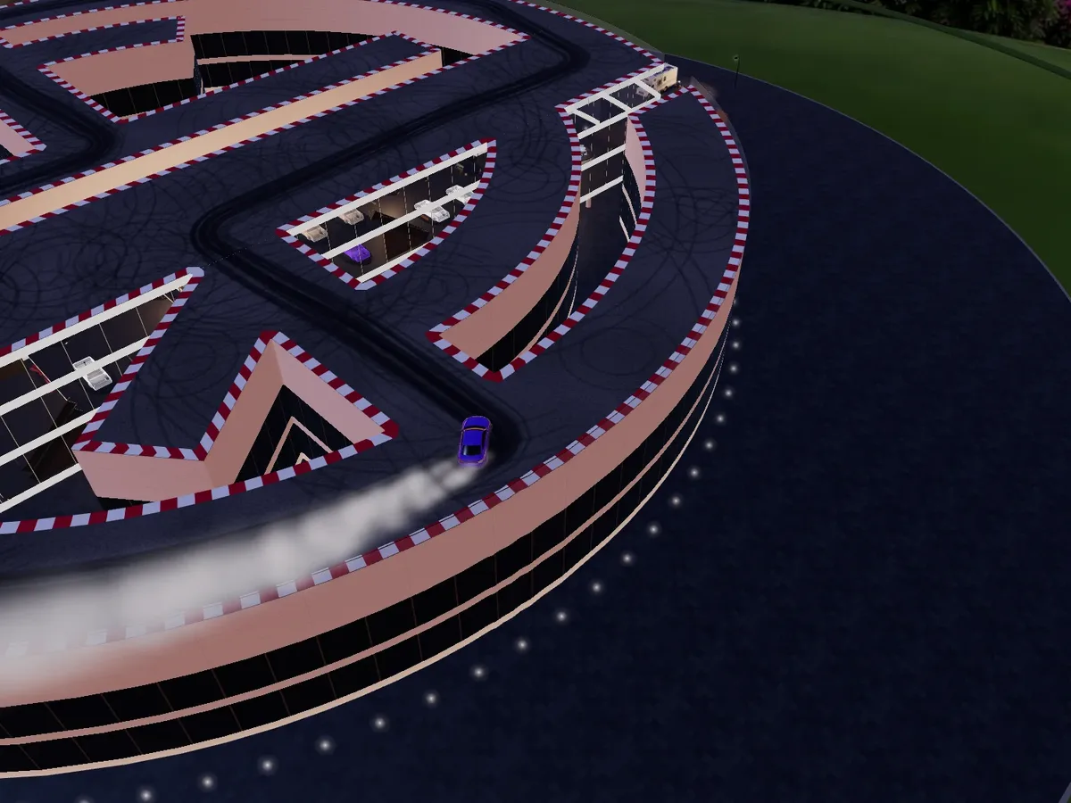Yehia Rashdan car museum: a ring building in the shape of his YR logo, its roof a drift track